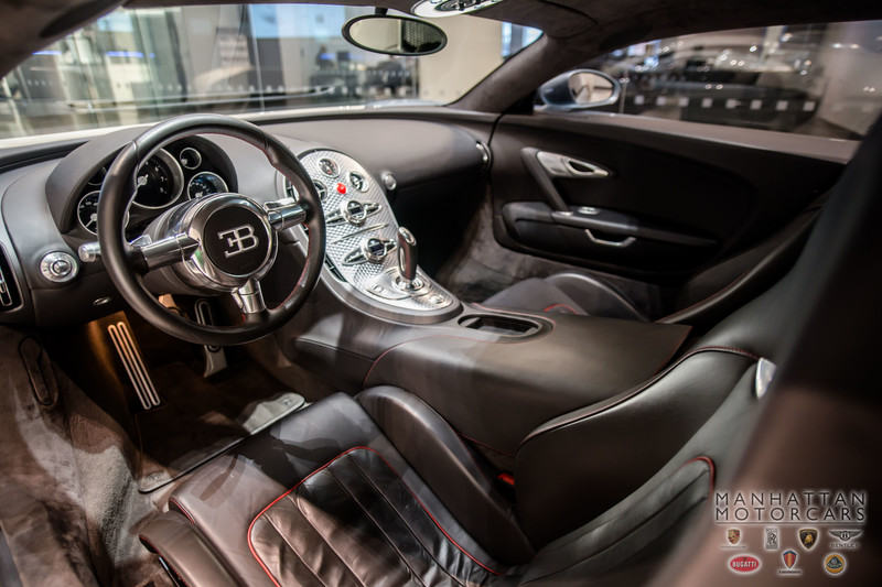 Illustration for article titled Why Buy Three Private Islands When You Can Buy This Used Bugatti Veyron?